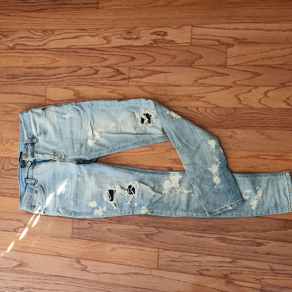 Serenade "black truffle" Men's skinny jeans. Distressed with bleaching detail.